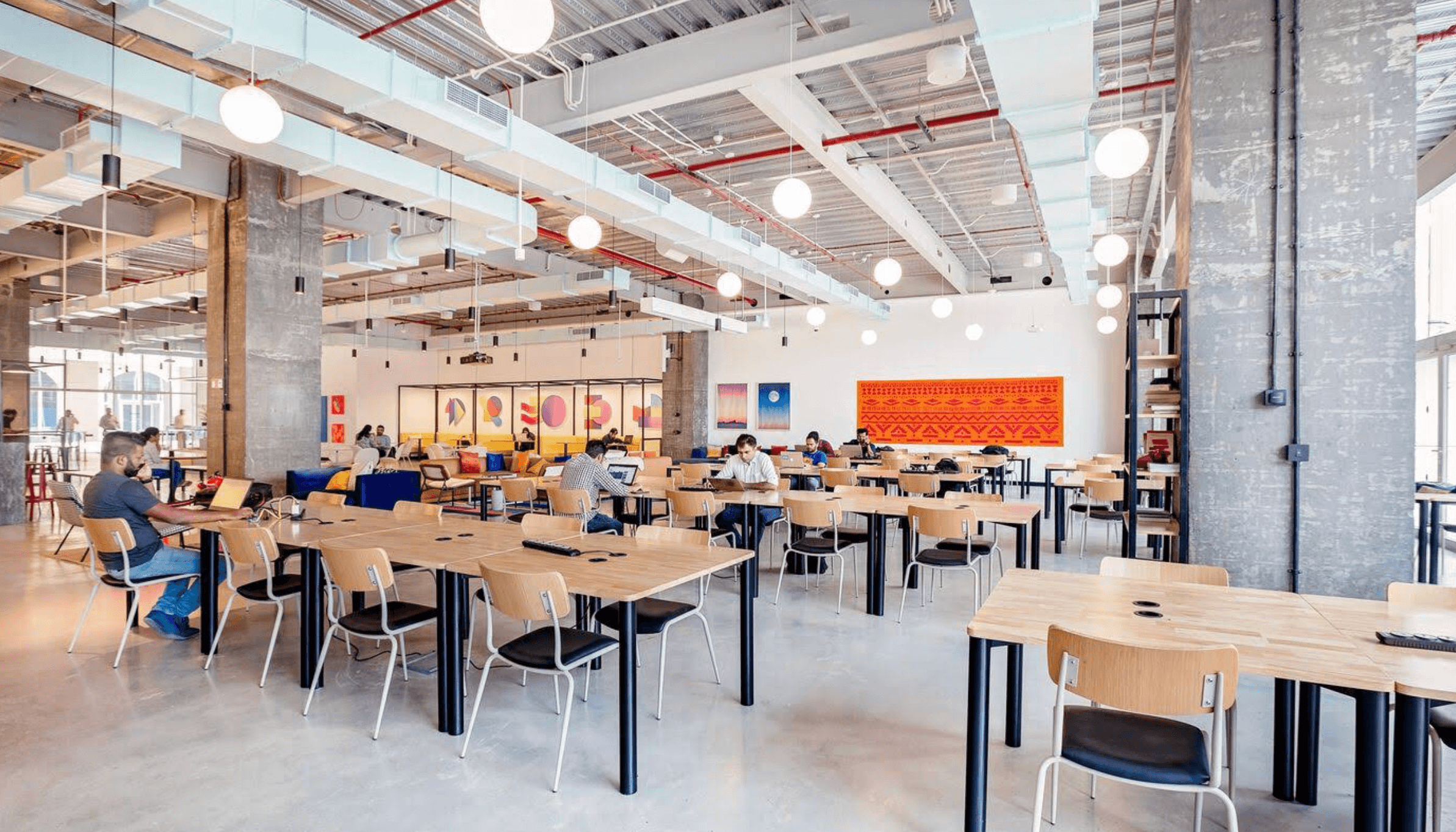 Open workspace at the Wework Forum DLF Cyber City office where the Unmatrix Tech team works